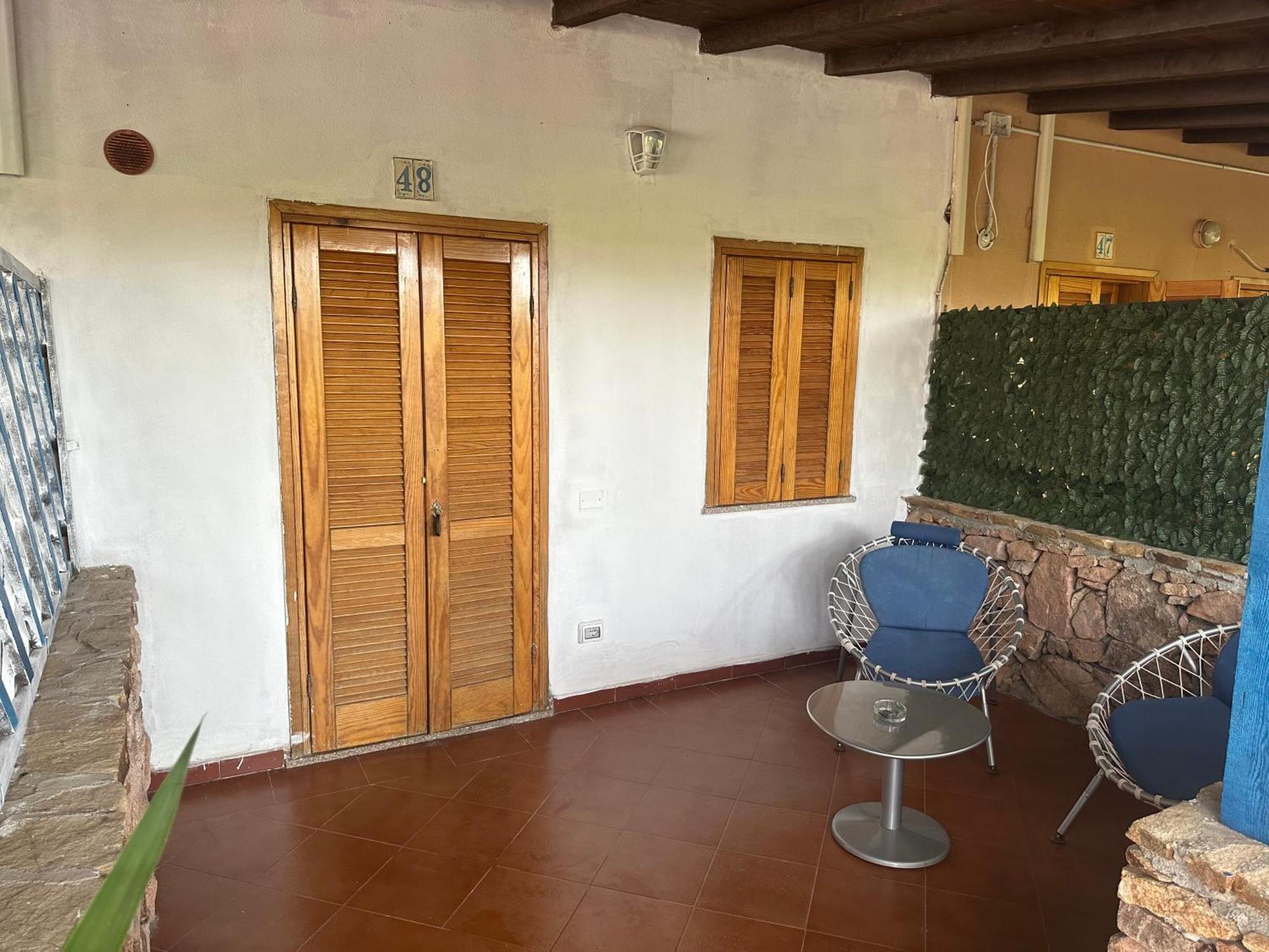 Le Stanze Del Mare Aparthotel Golfo Aranci Exterior photo