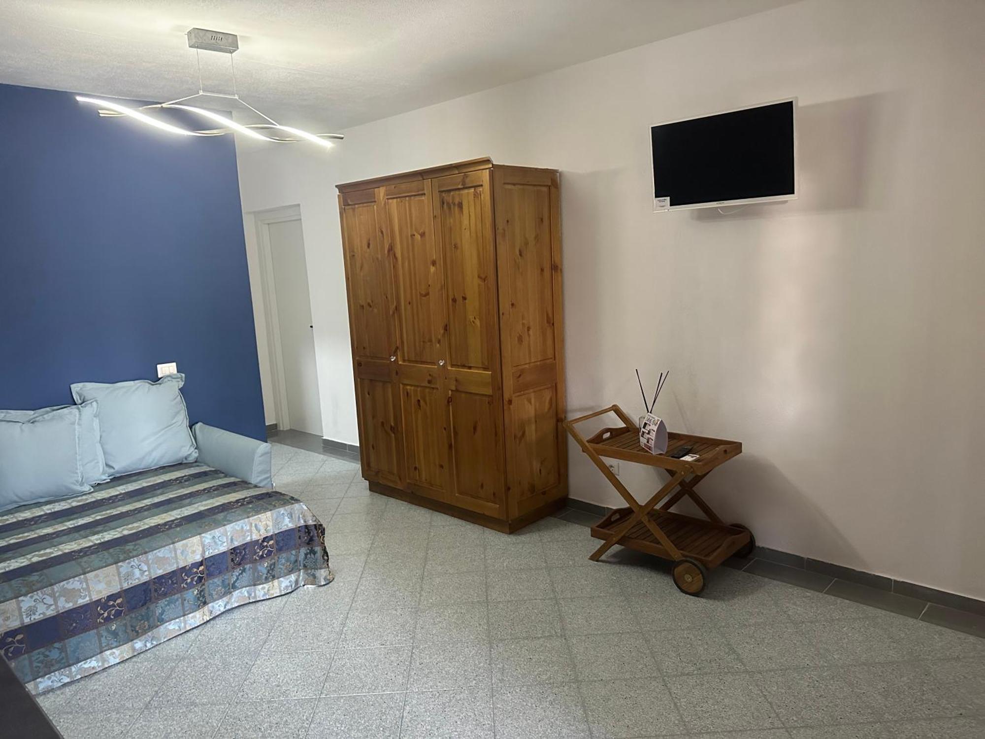 Le Stanze Del Mare Aparthotel Golfo Aranci Exterior photo